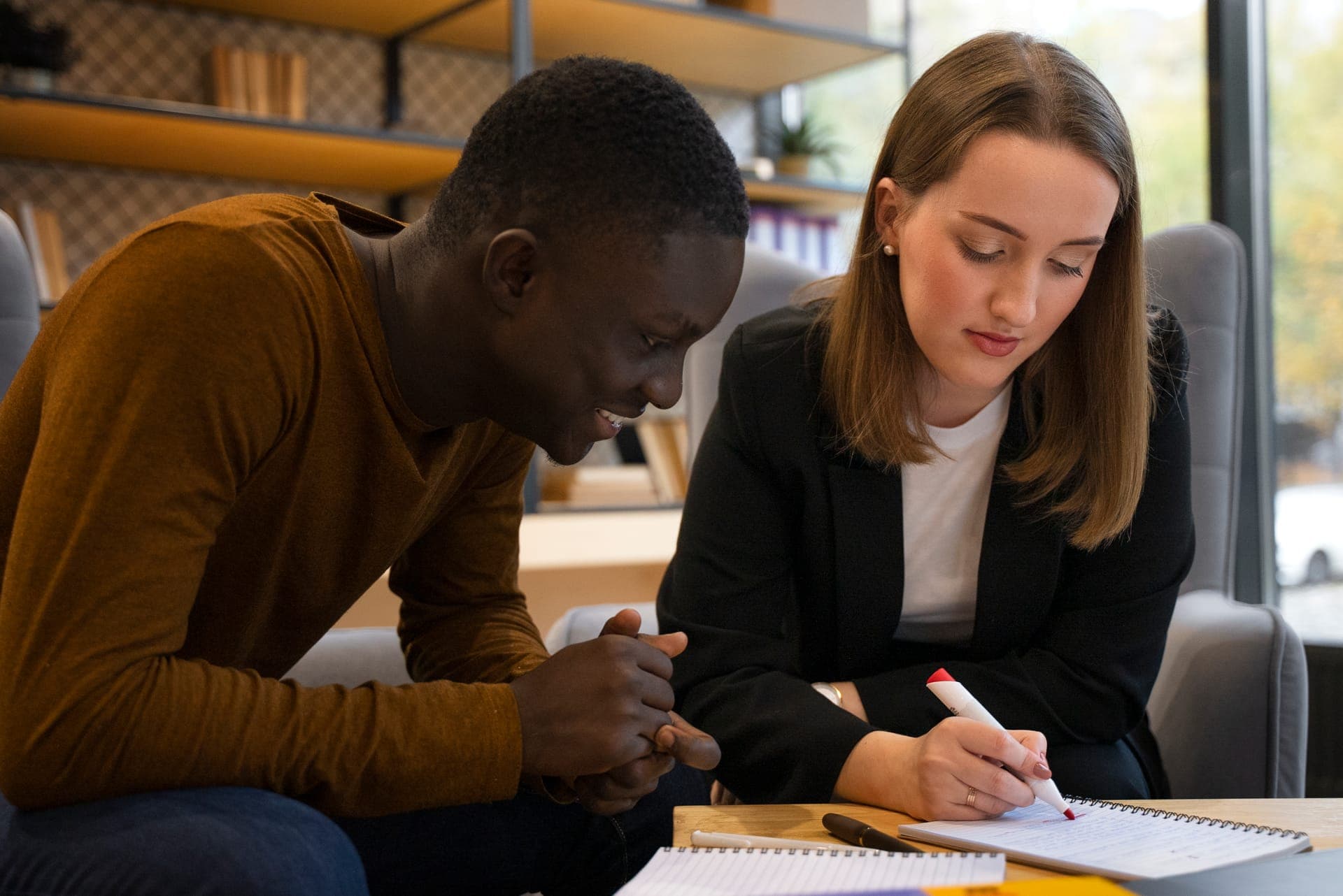 Signing Polish immigration documents with lawyer assistance - work permit and visa application paperwork